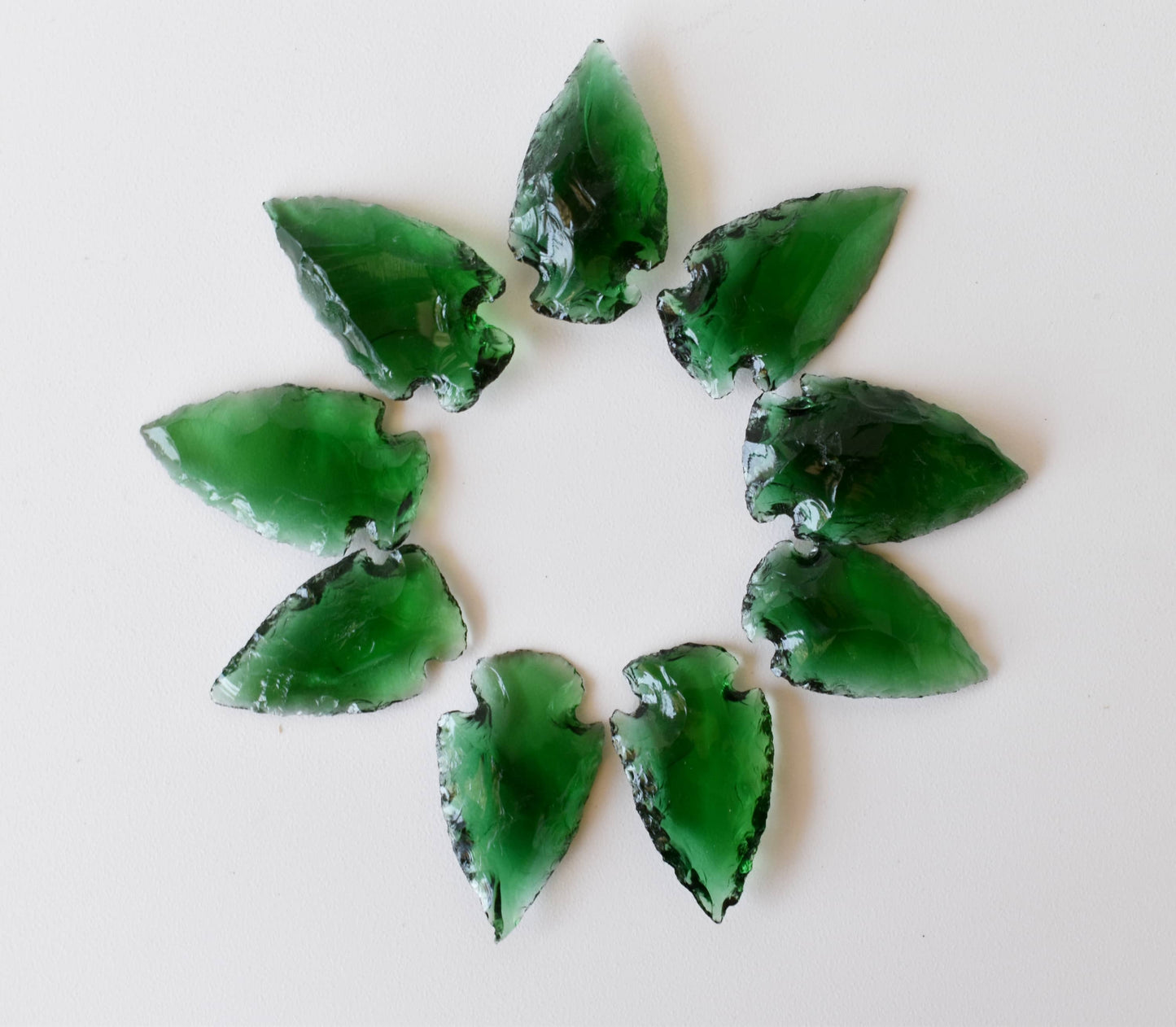 1.25'' Green Glass Arrowhead Point.
