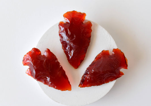 1.25'' Red Glass Arrowhead Point.